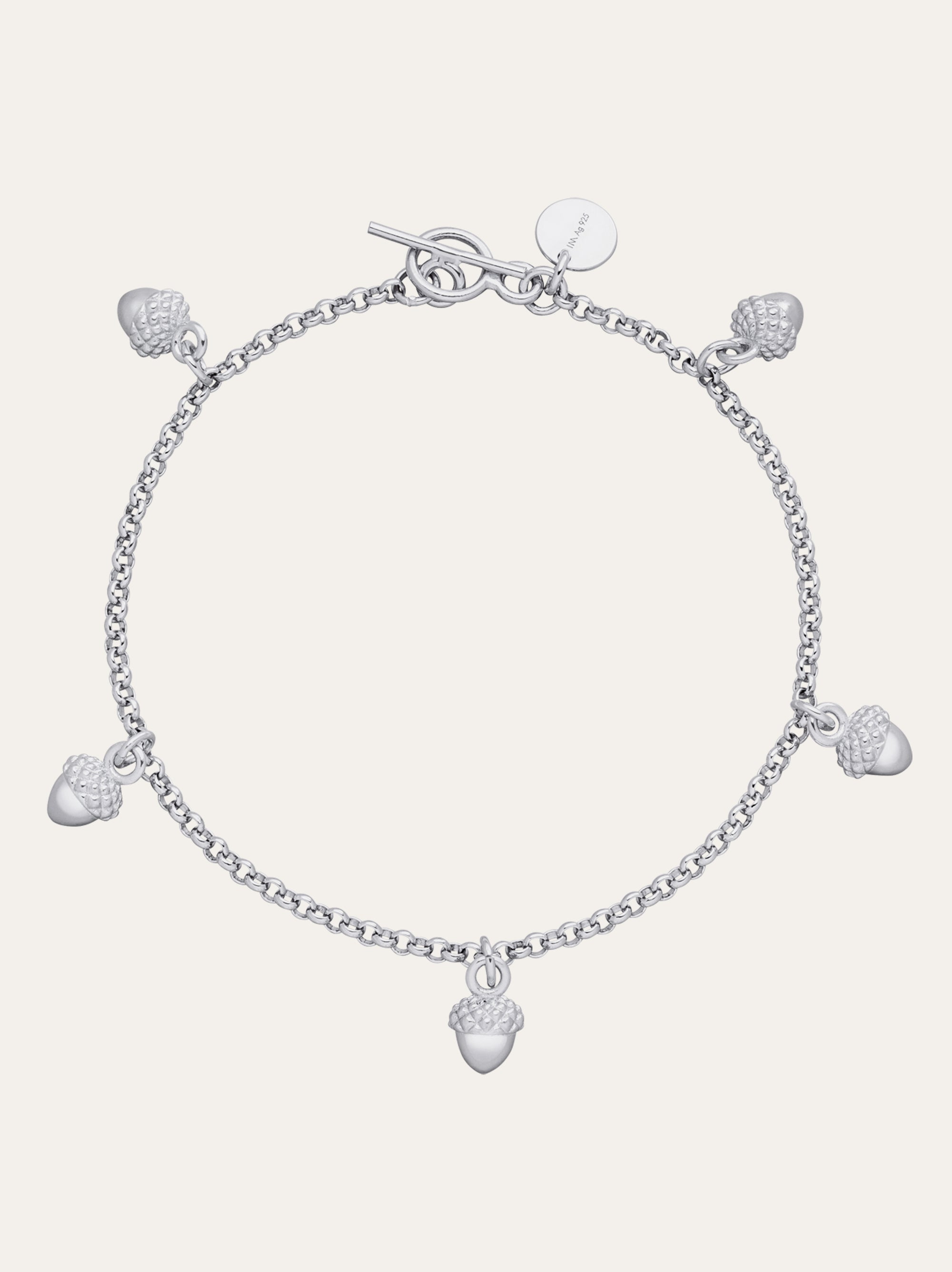 "Sterling Silver Acorn Charm Bracelet: 5 detailed charms on delicate chain. Lucky charm bracelet